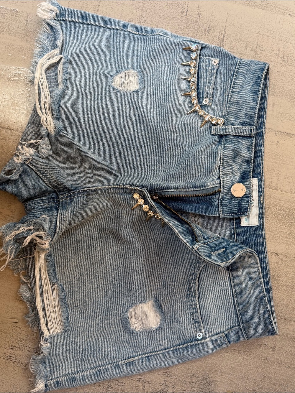 Light Blue Distressed Denim Shorts with Rhinestone Trim - Picture 2 of 3